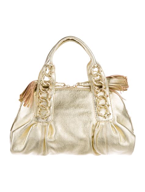 shiny purses|metallic purse.